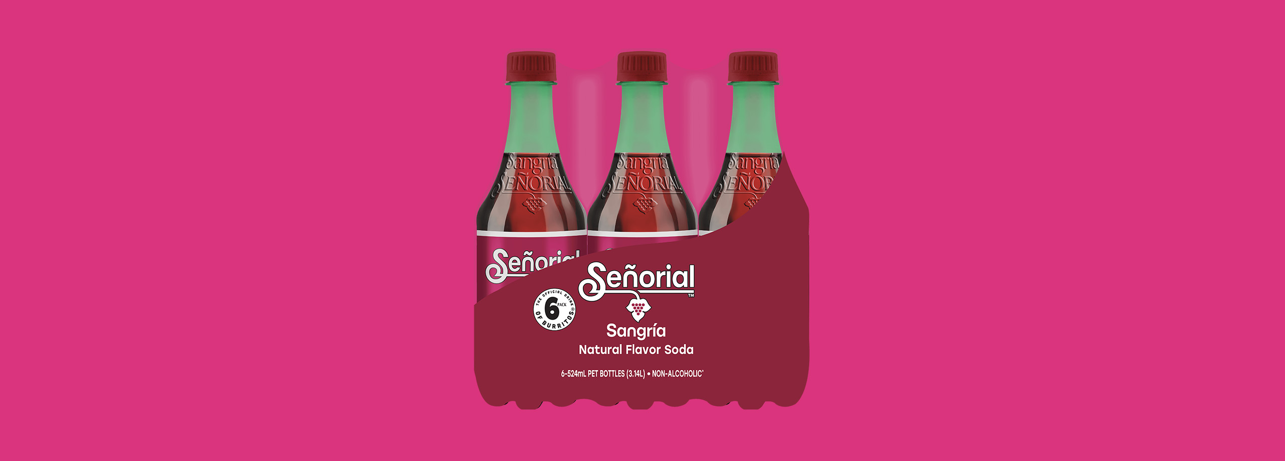 Sangría Señorial six-pack showcased against a bold pink background, highlighting its signature bottles and vibrant packaging.
