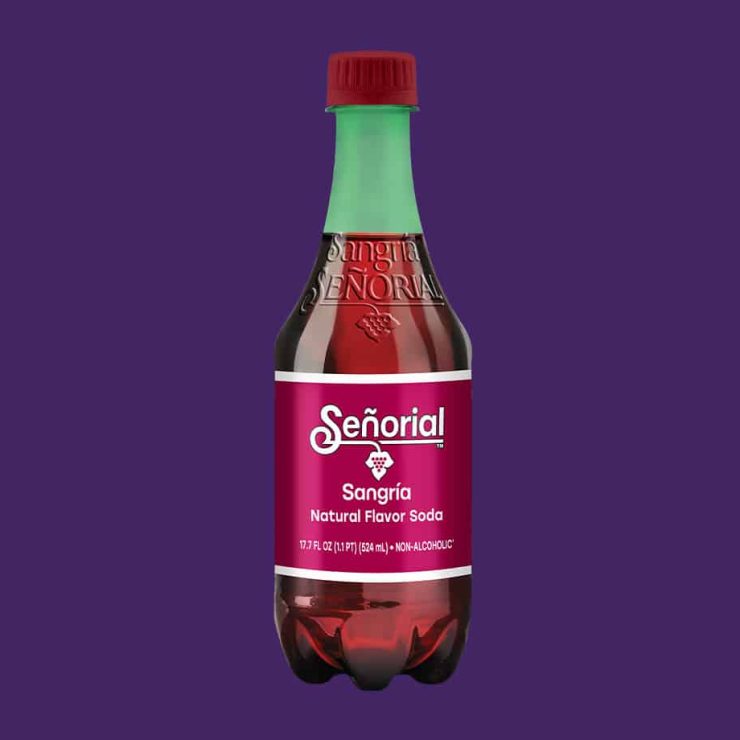 Sangria Senorial plastic bottle with deep red soda, signature label, and bold color contrast, highlighting a refreshing premium non-alcoholic beverage.