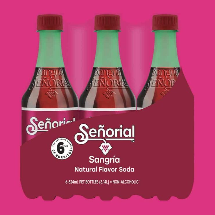 Sangria Senorial six-pack bottles with bold branding, presented as a refreshing premium non-alcoholic soda ideal for gatherings.