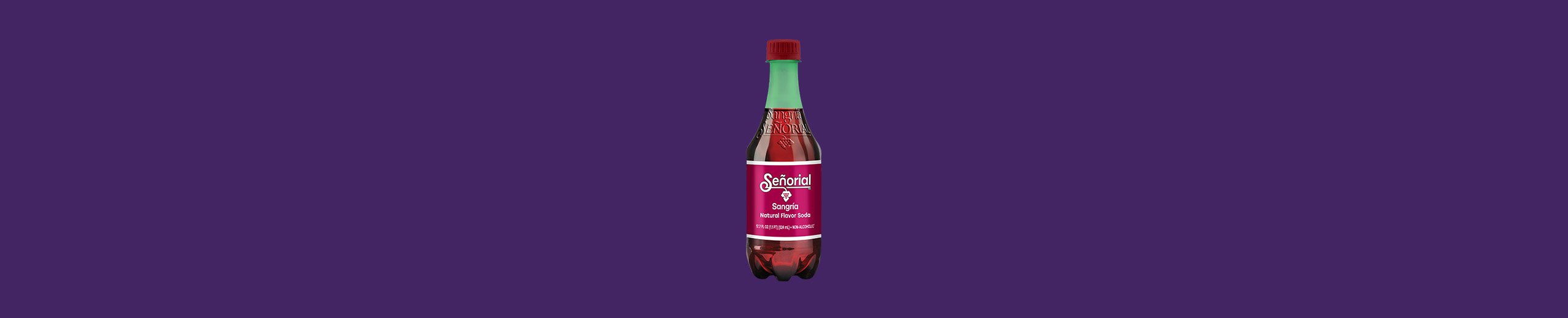 Single bottle of Sangría Señorial natural flavor soda centered on a solid purple background, showcasing its signature burgundy label and green cap.